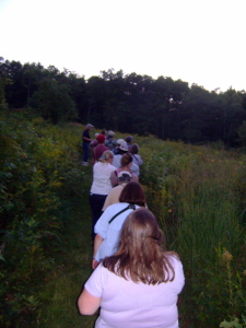 The group moves through a path at Steere Hill in Glocester. 